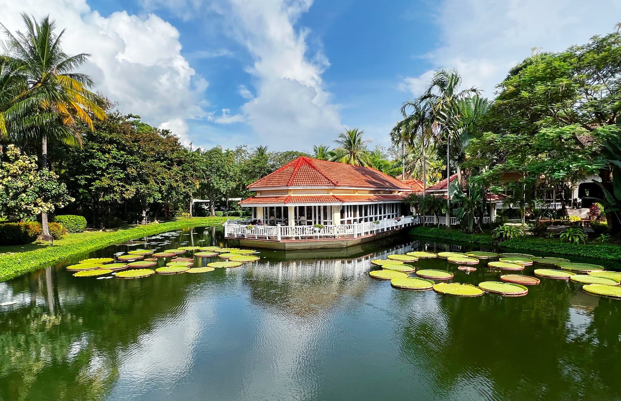 Sofitel Angkor Phokeethra hotel near Siem Reap reflecting on a peaceful pond