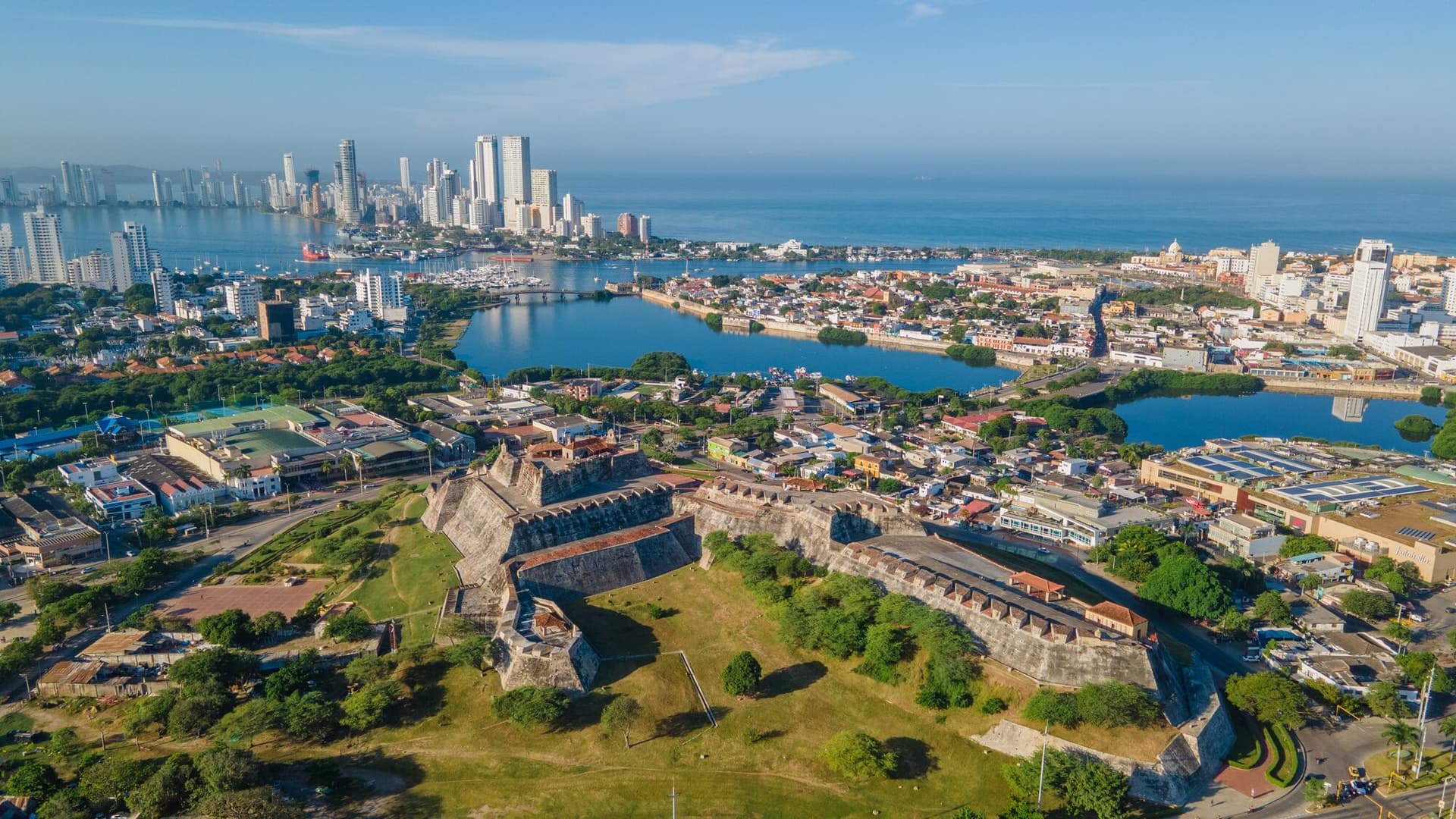 An aerial view of the San Felipe Castle with other buildings and the ocean surrounding it in Colombia, South America